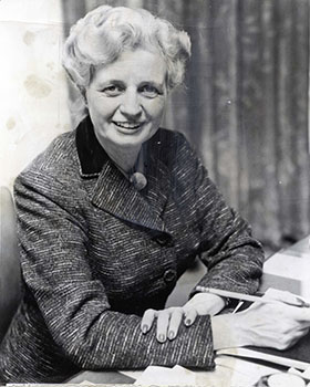 Katherine Oettinger (pictured here in 1957) was both the first Children's Bureau Chief formally trained in social work and the first working mother to serve as Chief. (Associated Press)